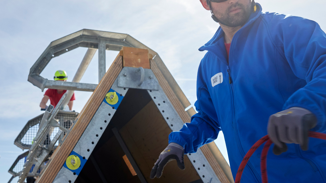 Cteam workers assembling a tower structure, showcasing expertise in complex industrial installations. Cteam workers assembling a tower structure, showcasing expertise in complex industrial installations.